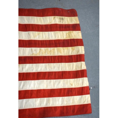 356 - TWO VINTAGE MILITARY FLAGS. Pole 104 cm long. (2)