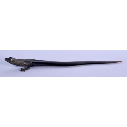 358 - A 19TH CENTURY CONTINENTAL BRONZE CAPPED HORN LIZARD possibly a paper knife. 23.5 cm long.