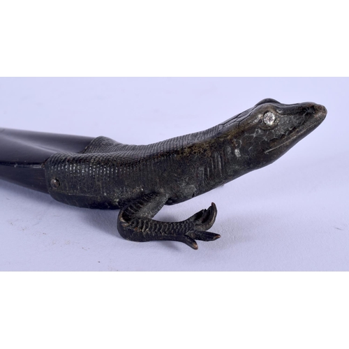 358 - A 19TH CENTURY CONTINENTAL BRONZE CAPPED HORN LIZARD possibly a paper knife. 23.5 cm long.