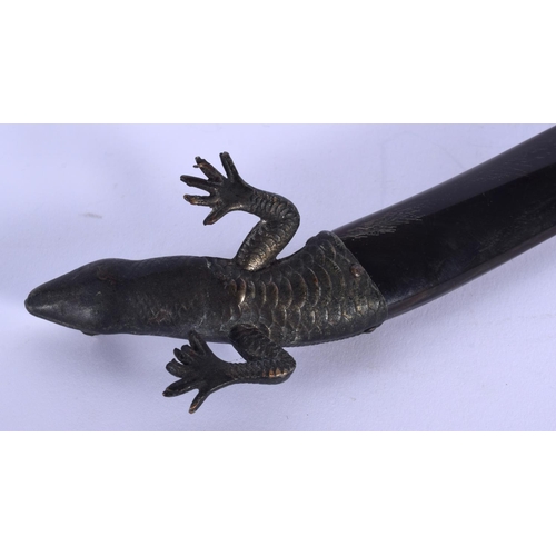 358 - A 19TH CENTURY CONTINENTAL BRONZE CAPPED HORN LIZARD possibly a paper knife. 23.5 cm long.