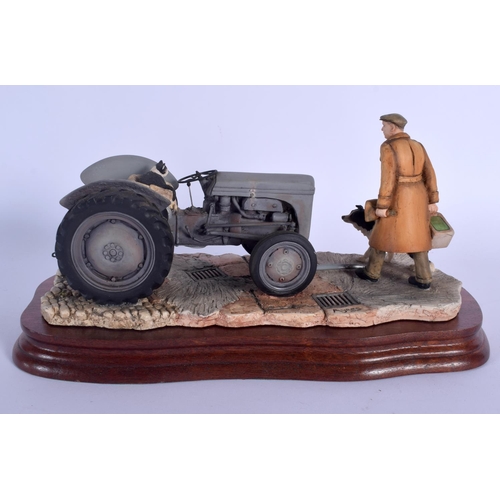 365 - A BORDER FINE ARTS FIGURE OF A MAN AND SHEEP DOG beside a tractor. 23 cm x 15 cm.