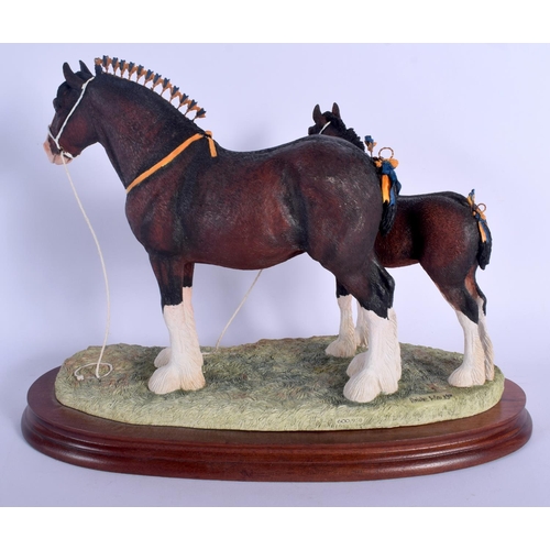 367 - A BORDER FINE ARTS FIGURE OF CHAMPION MARE & FOAL with certificate. 30 cm x 25 cm.