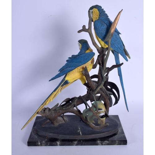 368 - A LARGE BORDER FINE ARTS FIGURE OF A BLUE AND GOLD MACAWS with certificate. 42 cm x 16 cm.