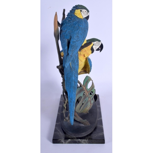 368 - A LARGE BORDER FINE ARTS FIGURE OF A BLUE AND GOLD MACAWS with certificate. 42 cm x 16 cm.