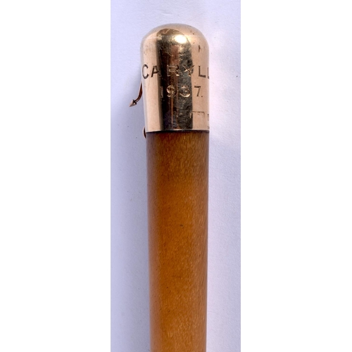 393 - A 19TH CENTURY 9CT GOLD MOUNTED CARVED RHINOCEROS HORN SWAGGER STICK by Swaine & Adenay. 47 grams. 4... 