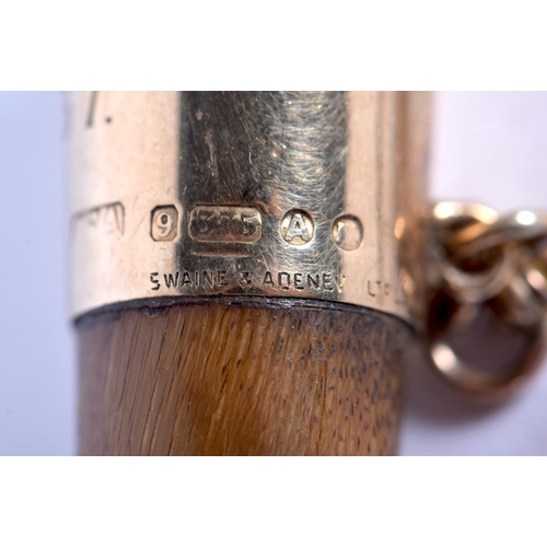 393 - A 19TH CENTURY 9CT GOLD MOUNTED CARVED RHINOCEROS HORN SWAGGER STICK by Swaine & Adenay. 47 grams. 4... 