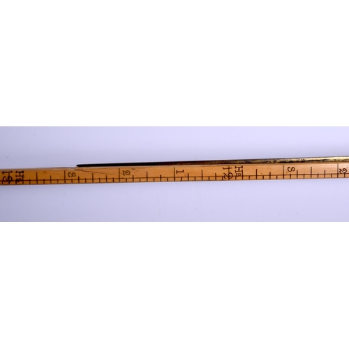 422 - AN ANTIQUE SILVER MOUNTED BAMBOO HORN MEASURING STICK. 92 cm long.