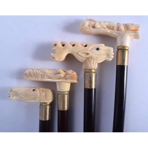 433 - FOUR CONTINENTAL CARVED BONE WALKING CANES with ebonised shafts. Largest 95 cm long. (4)