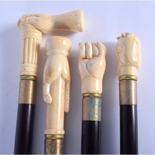 435 - FOUR CONTINENTAL CARVED BONE WALKING CANES with ebonised shafts. Largest 95 cm long. (4)