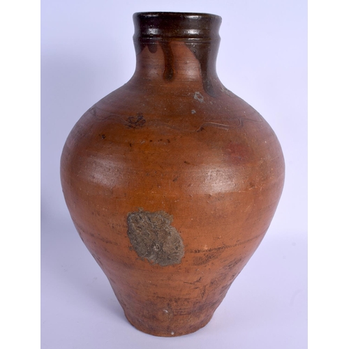 48 - A LARGE 18TH/19TH CENTURY ENGLISH STONEWARE PITCHER with simple scrafito decoration. 37 cm high.