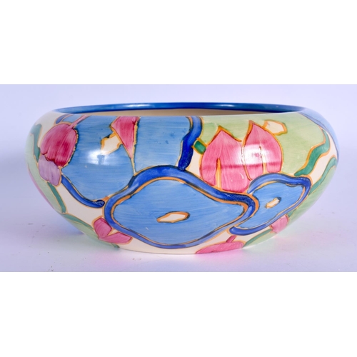 55 - AN ART DECO CLARICE CLIFF BIZARRE POTTERY BOWL painted with blue and pink flowers. 17 cm diameter.