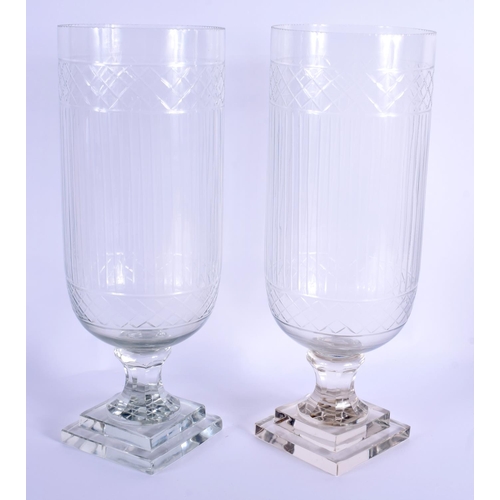 6 - A PAIR OF EUROPEAN CELERY STORM STYLE GLASS VASES. 40 cm high.