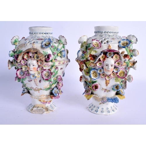 60 - A PAIR OF 18TH CENTURY CHELSEA RETICULATED PORCELAIN VASES encrusted with flowers and mask heads. 21... 