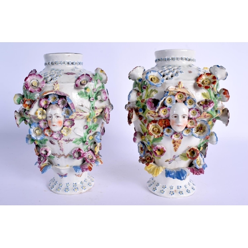 60 - A PAIR OF 18TH CENTURY CHELSEA RETICULATED PORCELAIN VASES encrusted with flowers and mask heads. 21... 