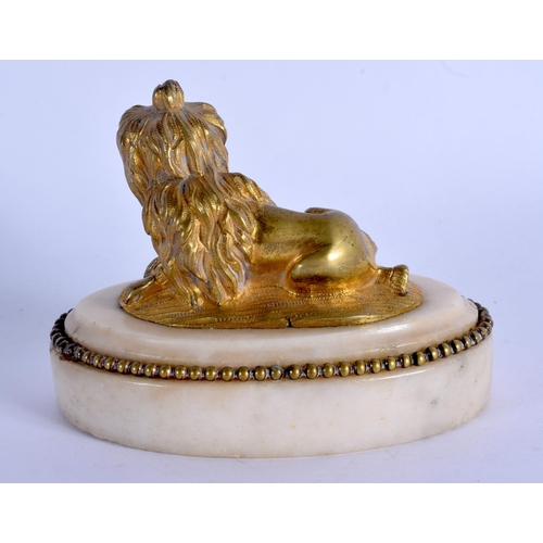 674 - A 19TH CENTURY EUROPEAN GILT BRONZE FIGURE OF A DOG upon a marble base. 10 cm x 8 cm.