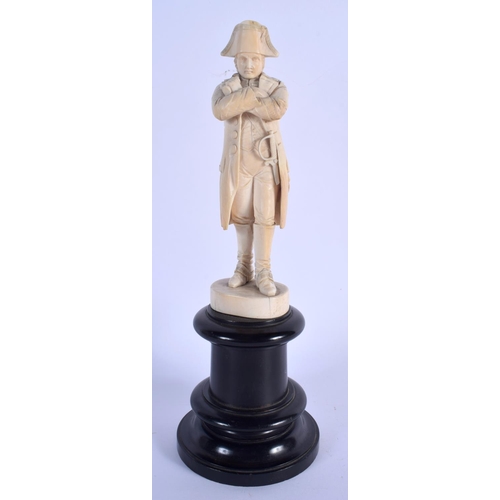 676 - A 19TH CENTURY EUROPEAN CARVED DIEPPE IVORY FIGURE OF NAPOLEON upon an ebonised base. Ivory 19.5 cm ... 