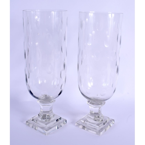 7 - A PAIR OF EUROPEAN CELERY STORM STYLE GLASS VASES. 34 cm high.