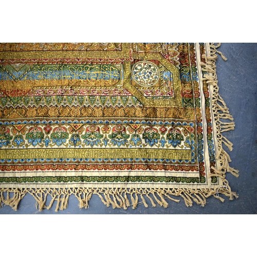 749B - A LARGE VINTAGE MIDDLE EASTERN EMBROIDERED SILK WALL HANGING. 179 cm x 240 cm.