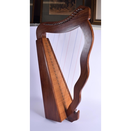 749E - A VINTAGE MUSICAL HARP. 77 cm x 44 cm.