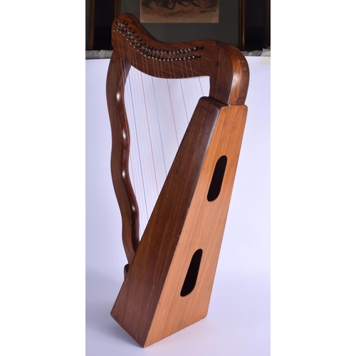 749E - A VINTAGE MUSICAL HARP. 77 cm x 44 cm.