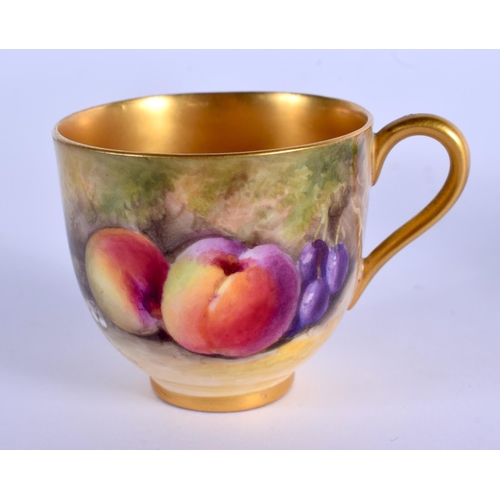 88 - Royal Worcester demi tasse coffee cup and saucer painted with fruit by Ricketts, signed, date code f... 