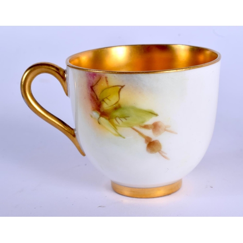 89 - Royal Worcester demi tasse cup and saucer painted with roses by Ethel Spilsbury and Mille Hunt, sign... 