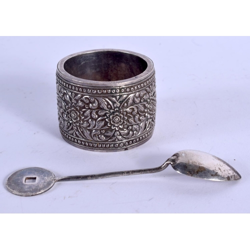 1005 - AN ANTIQUE SILVER NAPKIN RING and silver spoon. 53 grams. (2)