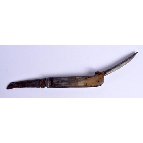 1012 - A 19TH CENTURY CONTINENTAL CARVED RHINOCEROS HORN COMBINATION KNIFE. 21 cm long extended.