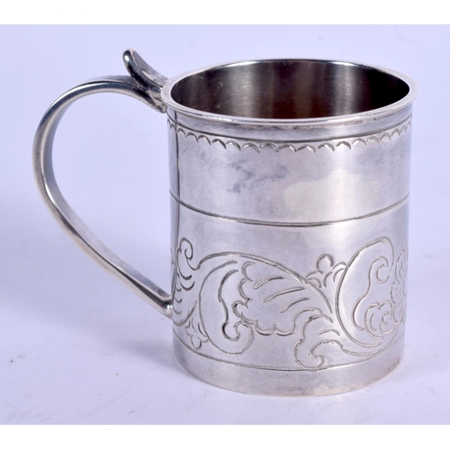 1038 - A MINIATURE 1920S SCOTTISH SILVER MUG. Glasgow 1927. 54 grams. 6.5 cm x 4.5 cm.