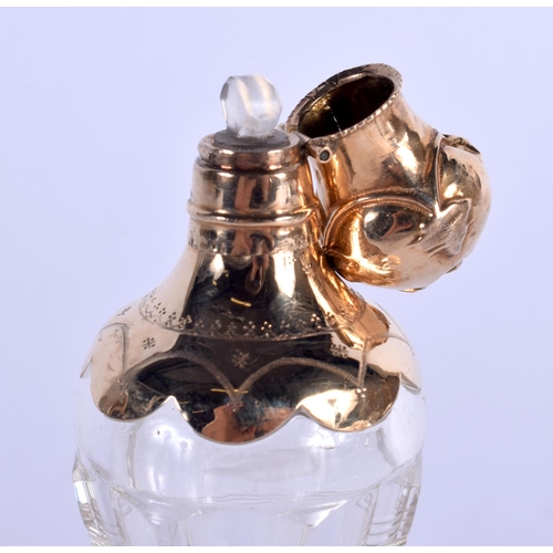 1044 - AN ANTIQUE 18CT GOLD FRENCH GLASS SCENT BOTTLE. 11 cm high.