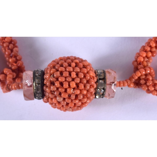 1053 - A 1930S CORAL BELT. 45 grams. 67 cm long.