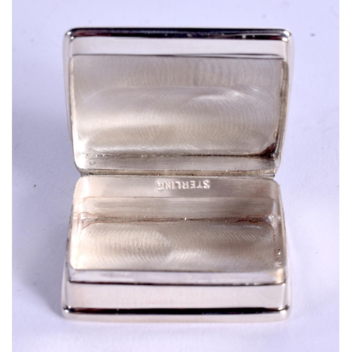 1067 - A SILVER CRICKET SILVER BOX. 20 grams. 3 cm x 2.5 cm.