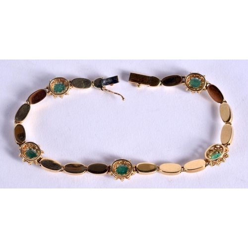 1102 - AN 18CT GOLD DIAMOND AND EMERALD BRACELET. 13 grams. 18 cm long.