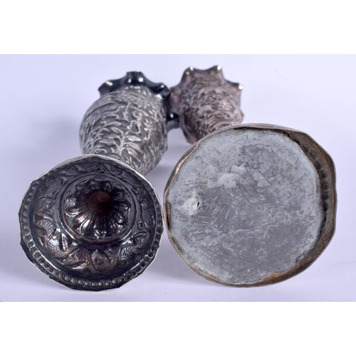 1104 - TWO EARLY 20TH CENTURY INDIAN WHITE METAL VASES. 823 grams (one weighted). Largest 25 cm high. (2)