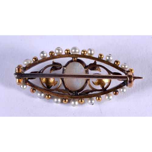 1110 - AN ANTIQUE GOLD ENAMEL AND OPAL BROOCH. 4 grams. 3.5 cm x 1.25 cm.