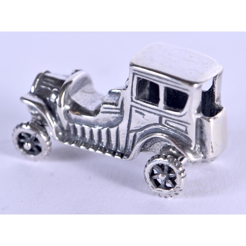 1112 - A SILVER CAR. 8 grams. 3 cm x 1 cm.