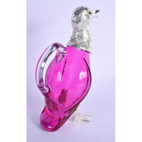 1148 - A SILVER PLATED CRANBERRY GLASS DUCK CLARET JUG. 27 cm high.