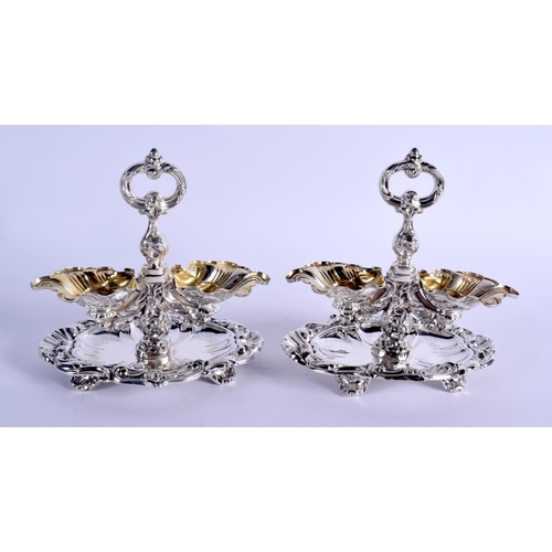 1181 - A PAIR OF 19TH CENTURY FRENCH TWIN HANDLED SILVER SALTS decorated with acanthus. 819 grams. 16 cm x ... 