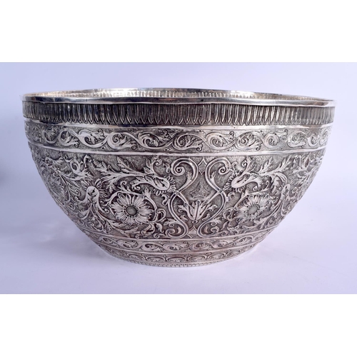 1183 - A VERY LARGE 19TH CENTURY INDIAN SILVER EMBOSSED BOWL of massive proportions. 2348 grams. 42 cm x 21... 