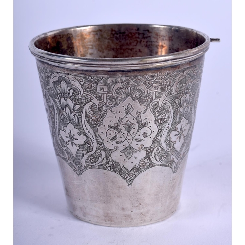 1192 - AN ANTIQUE PERSIAN SILVER BEAKER. 56 grams. 5 cm x 5 cm.