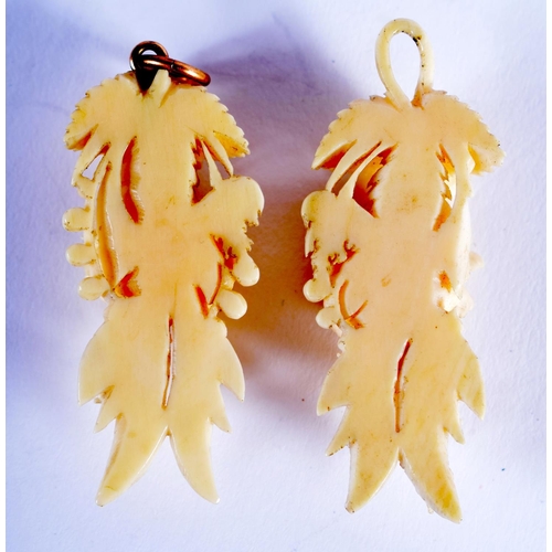 1198 - A PAIR OF 19TH CENTURY EUROPEAN IVORY EARRINGS. 9 grams. 5 cm long.