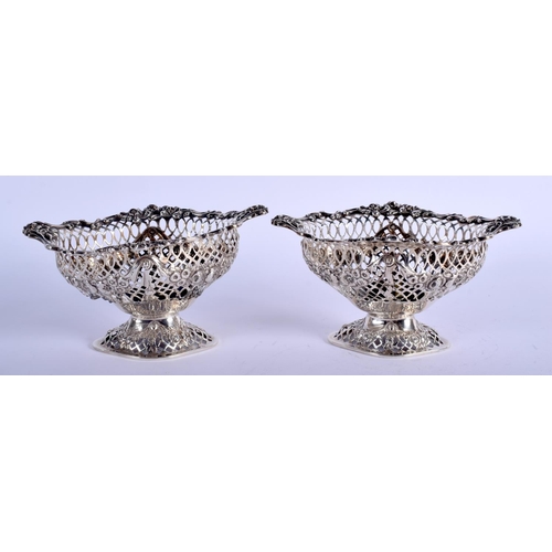 1203 - A PAIR OF VICTORIAN SILVER OPEN WORK DISHES. London 1893. 228 grams. 14 cm x 8 cm.