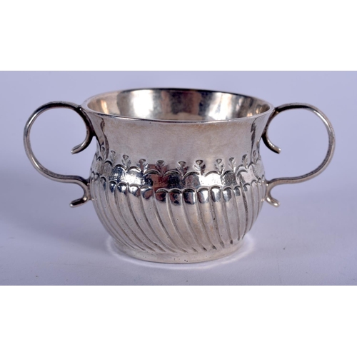 1213 - A RARE 18TH/19TH CENTURY MINIATURE SILVER TWIN HANDLED MUG. 22 grams. 6.5 cm x 3 cm.