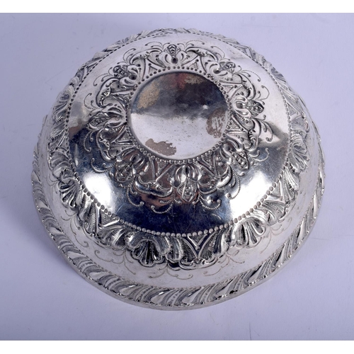 1214 - AN 18TH/19TH CENTURY CONTINENTAL SILVER BOWL with chased decoration.167 grams. 18 cm x 8 cm.