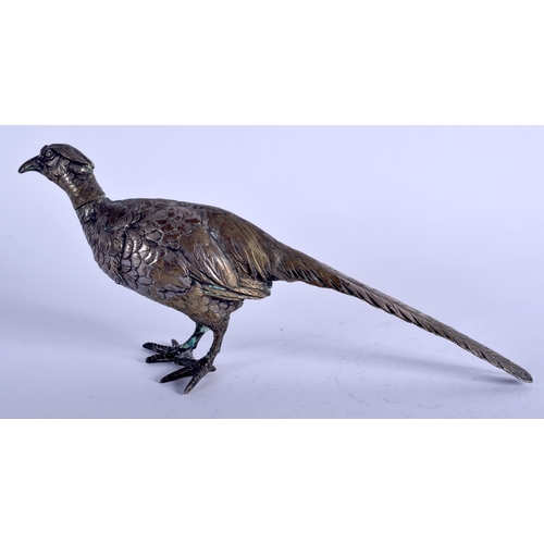 1263 - A 19TH CENTURY CONTINENTAL SILVER FIGURE OF A ROAMING GAME BIRD. 173 grams. 23 cm long.