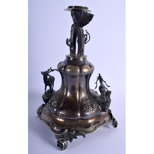 1264 - A RARE 19TH CENTURY CONTINENTAL SILVER TABLE CENTREPIECE formed as roaming stands, decorated with fo... 