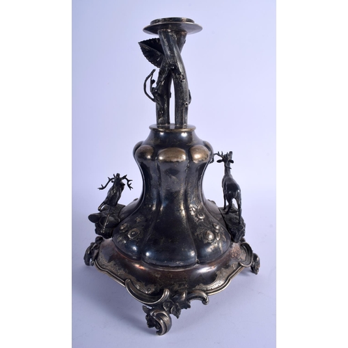 1264 - A RARE 19TH CENTURY CONTINENTAL SILVER TABLE CENTREPIECE formed as roaming stands, decorated with fo... 