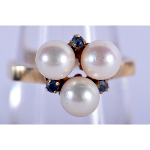 1291 - A 9CT GOLD PEARL AND SAPPHIRE RING. 4 grams. M/N.