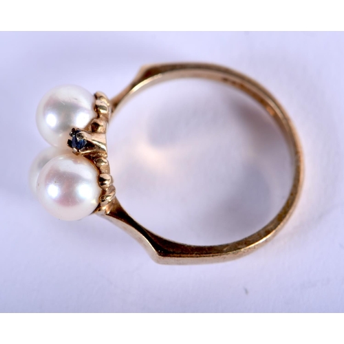 1291 - A 9CT GOLD PEARL AND SAPPHIRE RING. 4 grams. M/N.