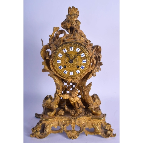 1484 - A MID 19TH CENTURY FRENCH ORMOLU MANTEL CLOCK modelled as a young boy emerging from a landscape, upo... 